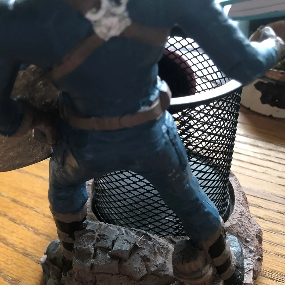 Black Mesh Pen Cup with Figurine Accent